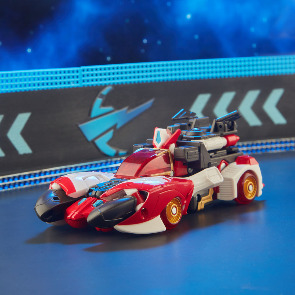 Transformers Generations Legacy - Figura Velolimone Speedia 500 (Override), Voyager Class 18 Cm, Da Cybertron Universe, Giocattolo Collezionabile